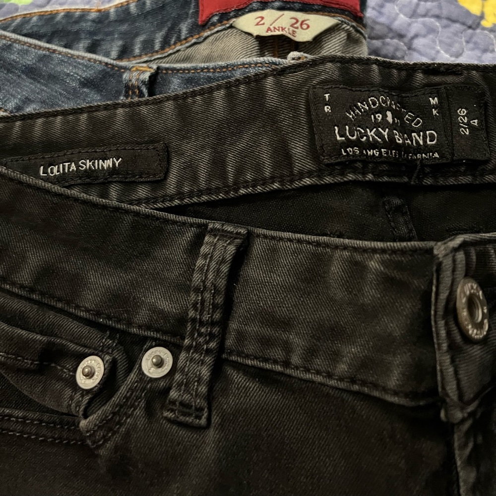 3 pairs of Lucky Jeans two blue one black skinny jeans worn